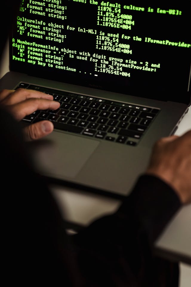 A hacker trying to hack a computer