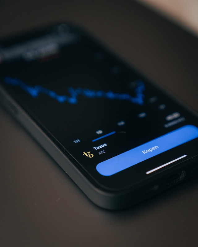 a close up of a cell phone on a table